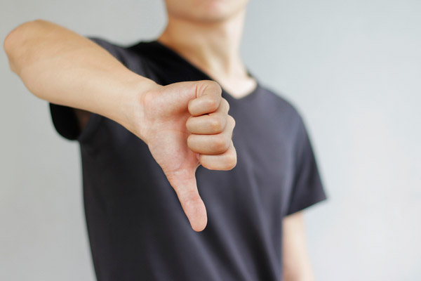 image of thumbs down depicting electrification of home heating systems