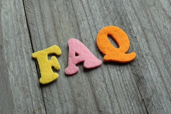FAQ spelled using letters made of felt cloth depicting Energy Efficient Heating System questions