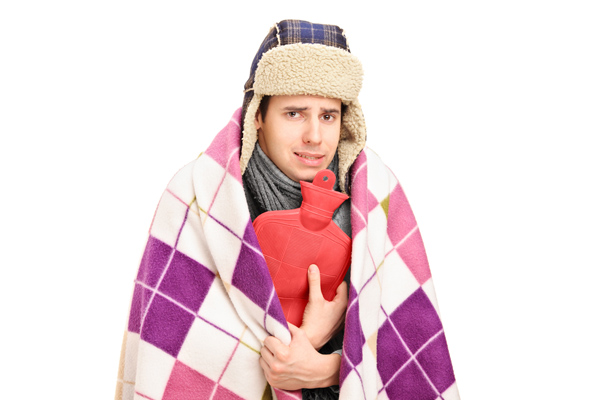 image of a homeowner feeling chilly due to running out of propane fuel for home heating