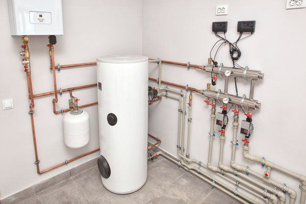 boiler room and modern efficient boiler hydronic heating system