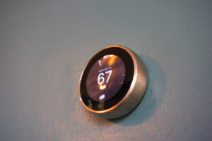 image of a wi-fi thermostat for a home heating system that uses fuel oil