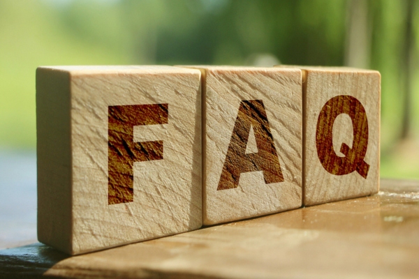 FAQ spelled using wooden letter cubes depicting heating problems questions