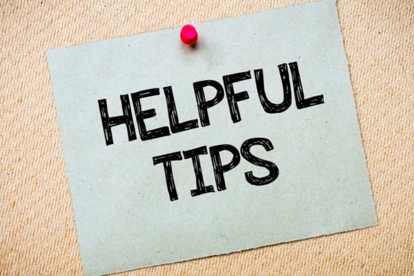 Helpful tips written on a paper and pinned on a board depicting air conditioner maintenance