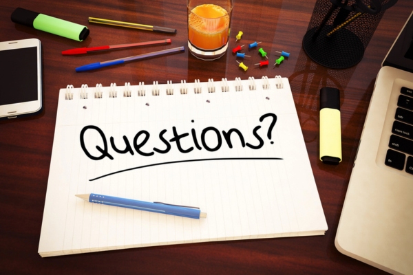 questions written on a notebook depicting FAQs about signs of leaky air ducts