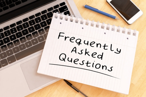 frequently asked questions written on a notebook depicting FAQs About Ductwork Replacement