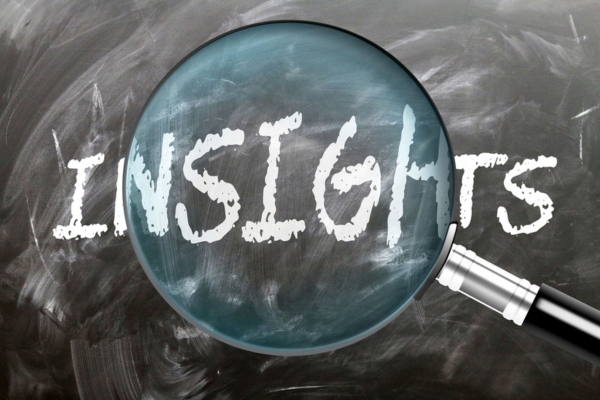 insights word on a chalkboard highlighted by a magnifying glass depicting Efficiency Ratings