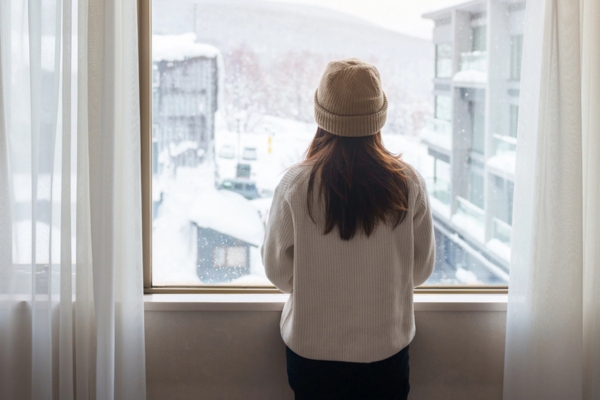 woman feeling cozy and warm indoors
