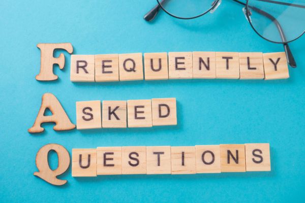 Frequently Asked Questions spelled using wooden letters and chips depicting questions about Preparing Your Hydronic Oil Heating Radiator
