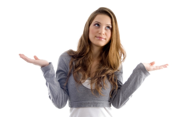 woman with hands raised on both sides depicting Furnace vs. Heat Pump