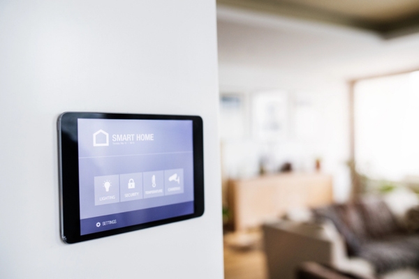 digital tablet mounted on the wall for smart home control