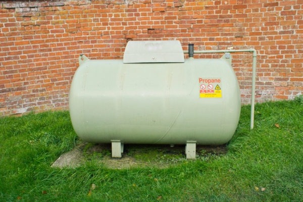 image of a propane tank installed outside the house