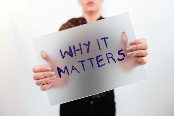 why it matters sign held up by a woman depicting heating oil Technological Progress