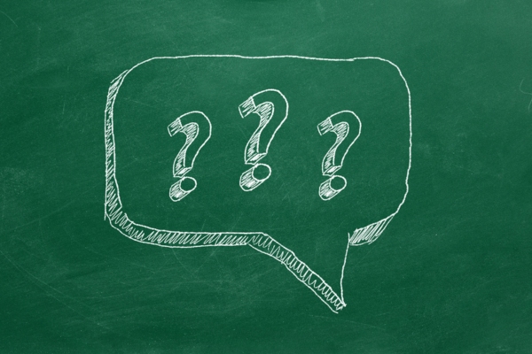 question marks inside a thought bubble drawn using chalk depicting FAQs about Propane Tank Regulators