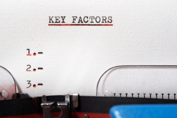 Key factors phrase written with a typewriter depicting When Selecting a Local Provider