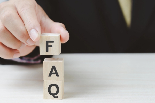 FAQ spelled using wooden letter cubes depicting HVAC Air Filter Replacement questions