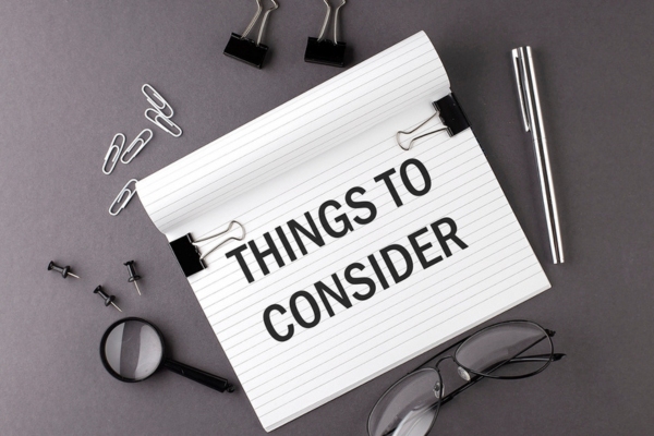 things to consider written on a notebook depicting Choosing a Reliable AC Replacement Company