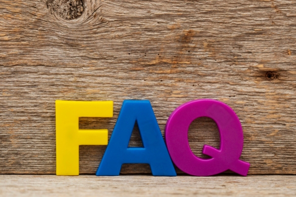 FAQ spelled using colorful 3D plastic letters depicting Air Conditioning Health Effects questions