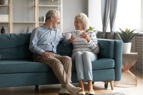senior couple relaxing on the couch