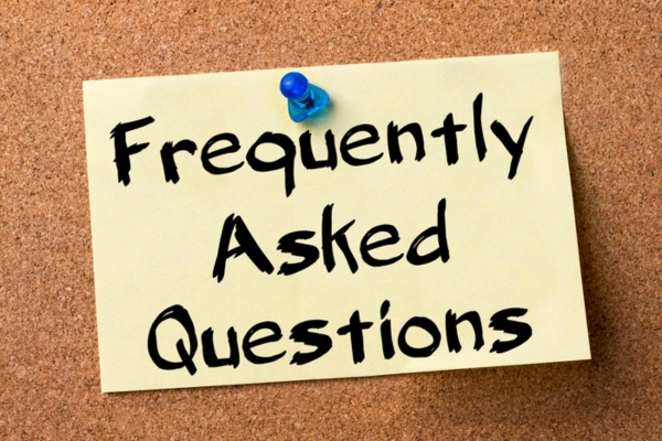 Frequently Asked Questions written on a sticky note pinned on a board depicting Water in Oil Tank FAQs